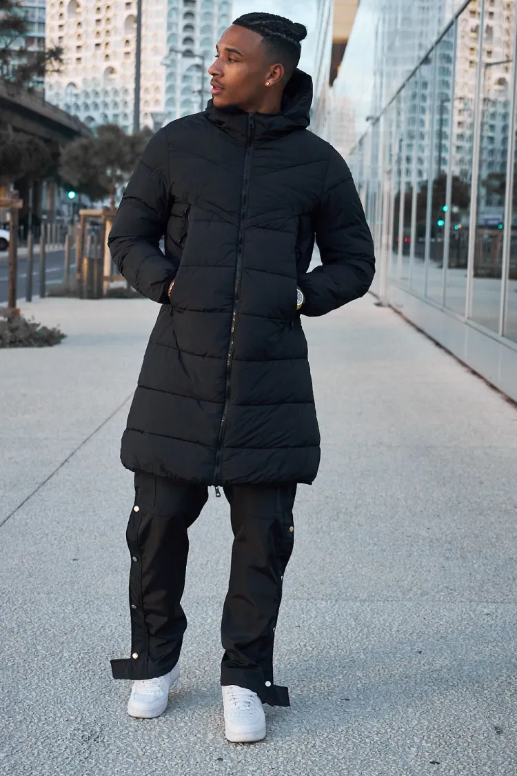 Doudoune matelassée longue noire à capuche