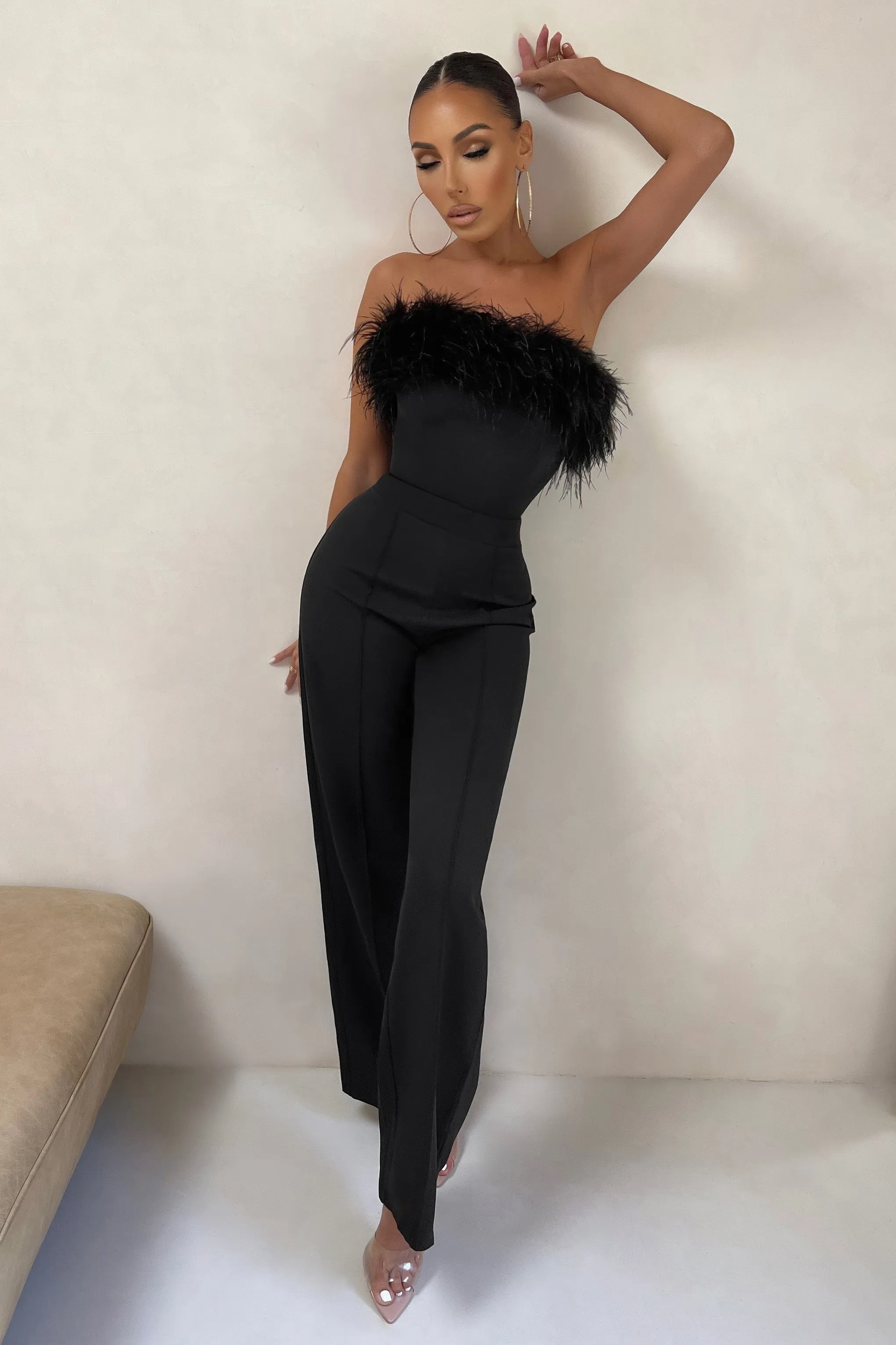 First Class | Petite Combinaison Noire A Jambes Evasees Et Haut Bandeau A Plumes