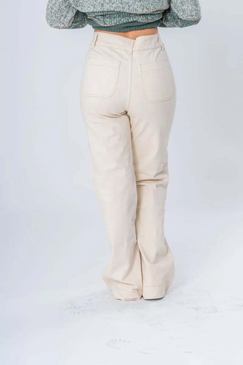 Jean coupe wide leg double boutons dorés beige