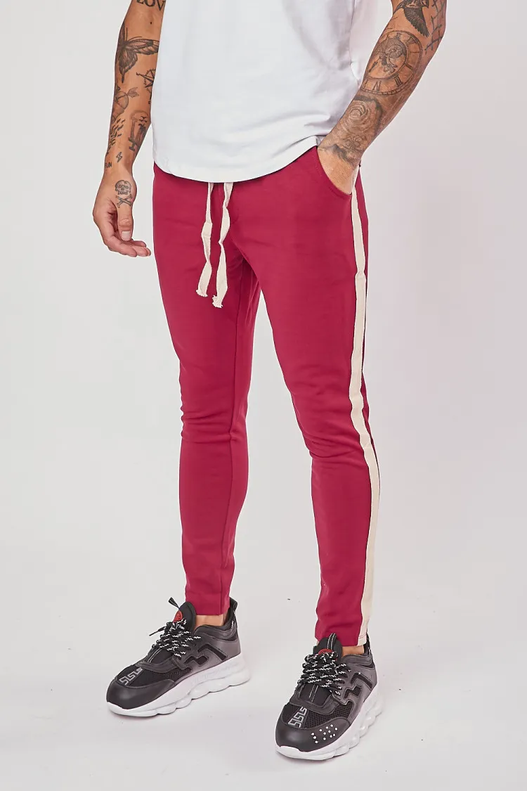 Pantalon slim bordeaux à bandes